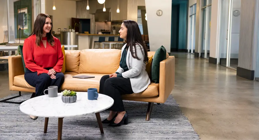 Two professional women having a conversation