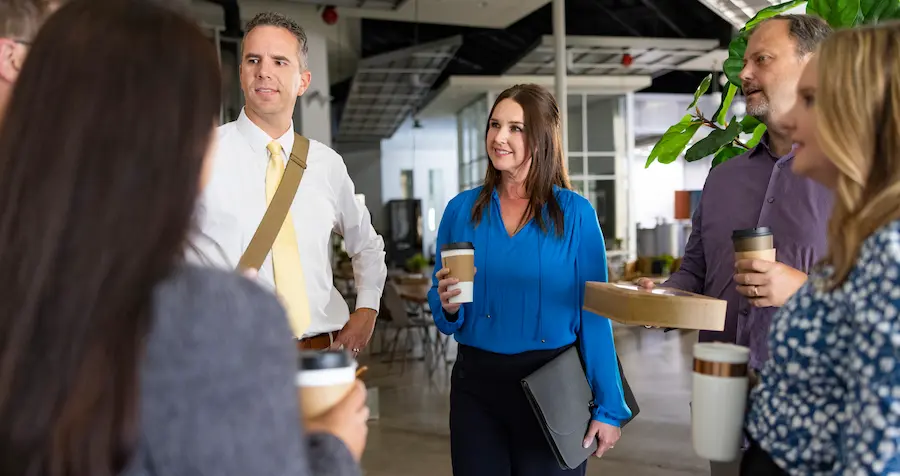 Group of professional men and women in a meeting