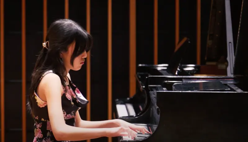 Student Playing Piano