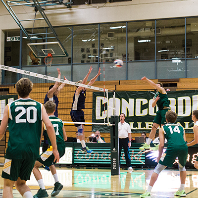 CUI students watching a game in their NCAA D2 shirts