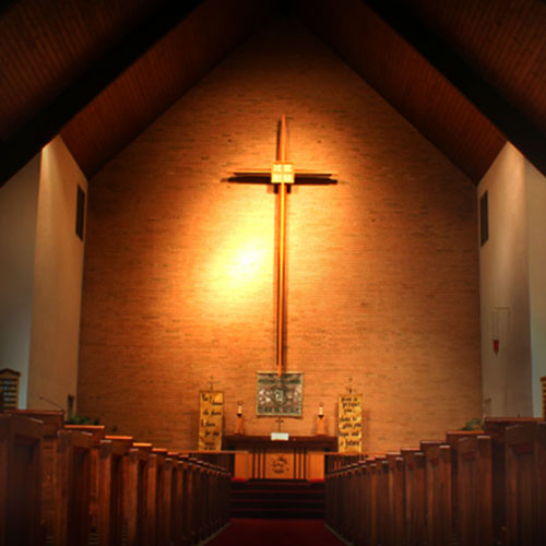 A cross above an alter