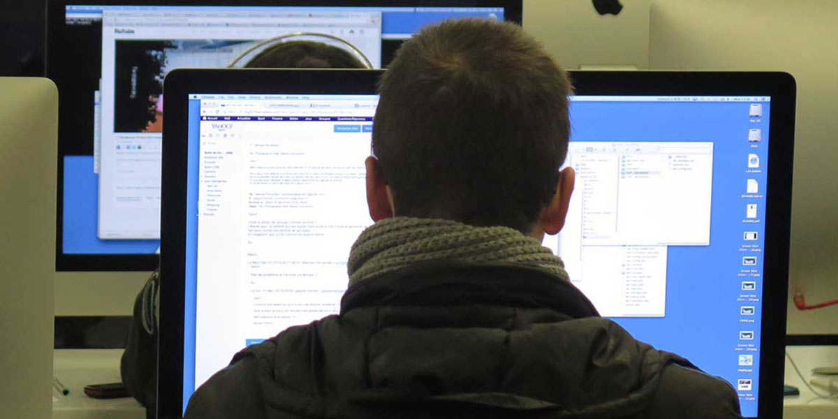 Man working in a computer lab
