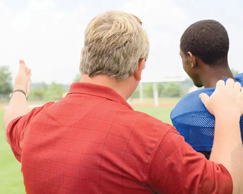 Coach Talks to Player