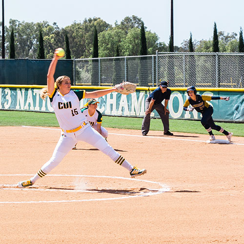 CUI Softball pitcher preparing to throw