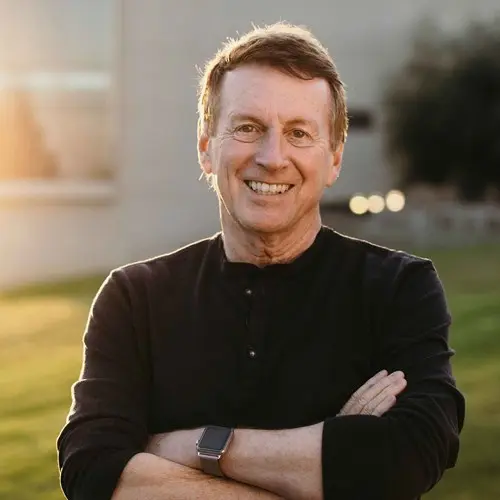 John Townsend outside Grimm Hall at sunset